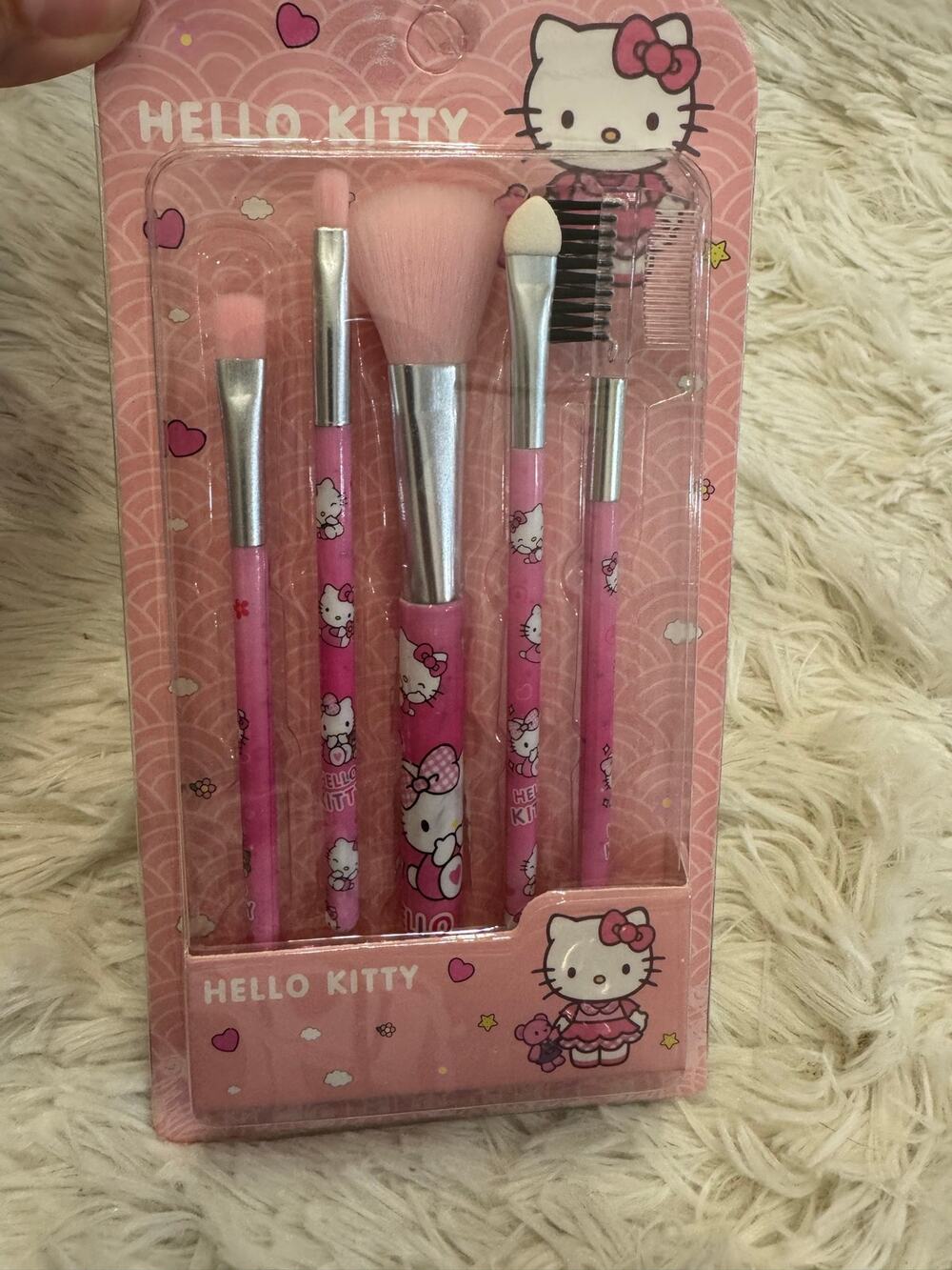 Hello Kitty pink makeup brush set with Hello Kitty graphics